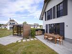 Terrasse - LuxusPlus Reetdachvilla mit 4 Schlafzimmern, Außensauna, Loungebereich und Kamin (G07) - Top-Hundeurlaub
