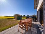 Terrasse - LuxusPlus Reetdachvilla mit 4 Schlafzimmern, Sauna und Kamin (G09) - Top-Hundeurlaub