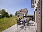Terrasse - LuxusPlus Reetdachvilla mit 4 Schlafzimmern, Außensauna, Loungebereich und Kamin (H06) - Top-Hundeurlaub
