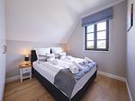Schlafzimmer - Premium Reetdachvilla mit 3 Schlafzimmern, Sauna und Kamin (H21) - Top-Hundeurlaub