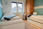 Schlafzimmer mit zwei Einzelbetten - Ferienhaus Ryokan - Top-Hundeurlaub