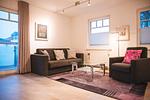 Sitzecke im Wohnzimmer - Wohnung Nr. 08 Zum Anker - Top-Hundeurlaub