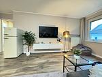 Blick in das moderne Wohnzimmer - Wohnung Nr. 128 Zur Seebrücke - Top-Hundeurlaub