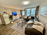 Gemütliches Wohnzimmer mit TV - Wohnung Nr. 128 Zur Seebrücke - Top-Hundeurlaub
