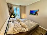 Schlafzimmer mit TV - Wohnung Nr. 128 Zur Seebrücke - Top-Hundeurlaub