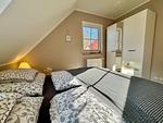 1. Schlafzimmer mit Doppelbett - Haus Ostseewelle - Top-Hundeurlaub