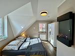 1. Schlafzimmer im 1. OG - Haus Ostseewelle - Top-Hundeurlaub