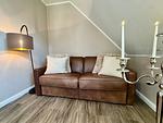 Schlafsofa im Hauptschlafzimmer - Haus Ostseewelle - Top-Hundeurlaub