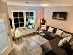 Gemütliches Wohnzimmer mit Schlafsofa - Haus Ostseewelle - Top-Hundeurlaub