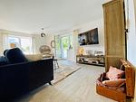 Wohnzimmer - Ferienwohnung Weltenbummler 18 Haus Strandbummler Baabe - Top-Hundeurlaub