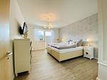 Schlafzimmer - Ferienwohnung Weltenbummler 18 Haus Strandbummler Baabe - Top-Hundeurlaub
