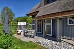 Hauptansicht - Ferienhaus Boddenbrise 13 Feriendorf Klein Stresow Rügen - Top-Hundeurlaub