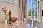 Wohnzimmer - Ferienhaus Auszeit 14 Feriendorf Klein Stresow Rügen - Top-Hundeurlaub