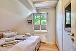 Schlafzimmer - Ferienhaus Auszeit 14 Feriendorf Klein Stresow Rügen - Top-Hundeurlaub