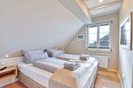 Schlafzimmer - Ferienhaus Auszeit 14 Feriendorf Klein Stresow Rügen - Top-Hundeurlaub