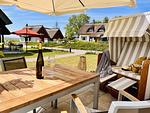 Terrasse - Ferienhaus Auszeit 14 Feriendorf Klein Stresow Rügen - Top-Hundeurlaub