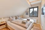Schlafzimmer - Ferienhaus Große Lage 16 Feriendorf Klein Stresow Rügen - Top-Hundeurlaub
