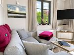 Wohnzimmer - Ferienhaus Große Lage 16 Feriendorf Klein Stresow Rügen - Top-Hundeurlaub
