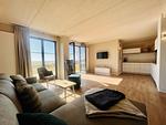 Wohnzimmer - Ferienhaus Seeblick 19 Feriendorf Klein Stresow Rügen - Top-Hundeurlaub