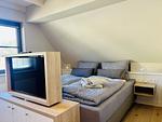 Schlafzimmer - Ferienhaus Seeblick 19 Feriendorf Klein Stresow Rügen - Top-Hundeurlaub