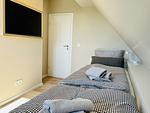 Schlafzimmer - Ferienhaus Seeblick 19 Feriendorf Klein Stresow Rügen - Top-Hundeurlaub