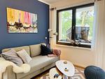 Wohnzimmer - Ferienwohnung Strandkorb & Mee(h)r Parkvillen Carlota und Candela Baabe - Top-Hundeurlaub