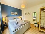 Schlafzimmer - Ferienwohnung Strandkorb & Mee(h)r Parkvillen Carlota und Candela Baabe - Top-Hundeurlaub
