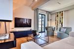 Wohnzimmer - Ferienwohnung Sonnenloft 14 mit eigenem Kamin und Sauna im Haus Düne 7 Prora - Top-Hundeurlaub