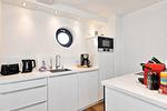 Küche / Küchenzeile - Ferienwohnung Lotsenloft 16 im Haus Düne 7 - Top-Hundeurlaub