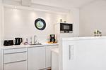 Küche / Küchenzeile - Ferienwohnung Lotsenloft 16 im Haus Düne 7 - Top-Hundeurlaub