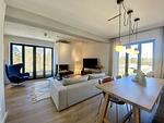 Wohnzimmer - Ferienwohnung Lotsenloft 16 im Haus Düne 7 - Top-Hundeurlaub