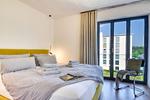 Schlafzimmer - Ferienwohnung Lotsenloft 16 im Haus Düne 7 - Top-Hundeurlaub