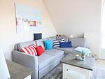 Wohnzimmer - Norderstr. 55c, Whg. 11, DG, Sundowner - Top-Hundeurlaub
