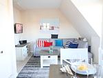Wohnzimmer - Norderstr. 55c, Whg. 11, DG, Sundowner - Top-Hundeurlaub