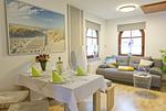 Großer Wohnbereich mit Esstisch - Ferienwohnung Storchennest - Top-Hundeurlaub