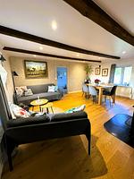Wohnzimmer mit Sitzbereich im Ferienhaus Liten Päronträdgård in Perstorp - Liten Päronträdgård - Top-Hundeurlaub