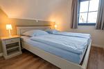 Schlafzimmer - Wiesenstraße 65a Haus Casa Blue - Top-Hundeurlaub