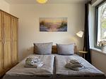Schlafzimmer - Ferienwohnung Meerzeit Parkvillen 11 Carlota und Candela Baabe - Top-Hundeurlaub
