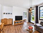 Wohnzimmer - Ferienwohnung Meerzeit Parkvillen 11 Carlota und Candela Baabe - Top-Hundeurlaub