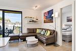 Wohnzimmer - Ferienwohnung "Lachmöwe" in der Villa Andrea Baabe - Top-Hundeurlaub