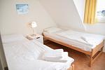 Schlafzimmer - Dünenstr. 31a, OG rechts - Top-Hundeurlaub