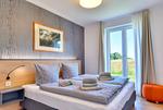 Schlafzimmer - Ferienwohnung Kranich 26 im Wreecher Idyll Rügen - Top-Hundeurlaub
