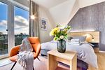 Wohnzimmer - Ferienwohnung Seeadler 33 im Wreecher Idyll Rügen - Top-Hundeurlaub