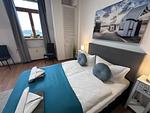 Ferienwohnung Hafenkante Schlafzimmer - Hafenkante - Ferienwohnung mit gratis WLAN mit Parkplatz - Top-Hundeurlaub