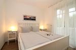 Schlafzimmer - Strandschlösschen Haus II Fewo 14 - Top-Hundeurlaub