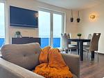 Wohnzimmer - Meerblickappartement mit Kamin - Top-Hundeurlaub