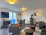 Wohnzimmer - Meerblickappartement mit Kamin - Top-Hundeurlaub