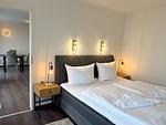 Schlafzimmer - Meerblickappartement mit Kamin - Top-Hundeurlaub