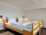 Schlafzimmer - Meerblickappartement mit Kamin - Top-Hundeurlaub