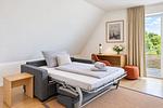 Schlafzimmer - Ferienwohnung Mantelmöwe 32 im Wreecher Idyll Rügen - Top-Hundeurlaub